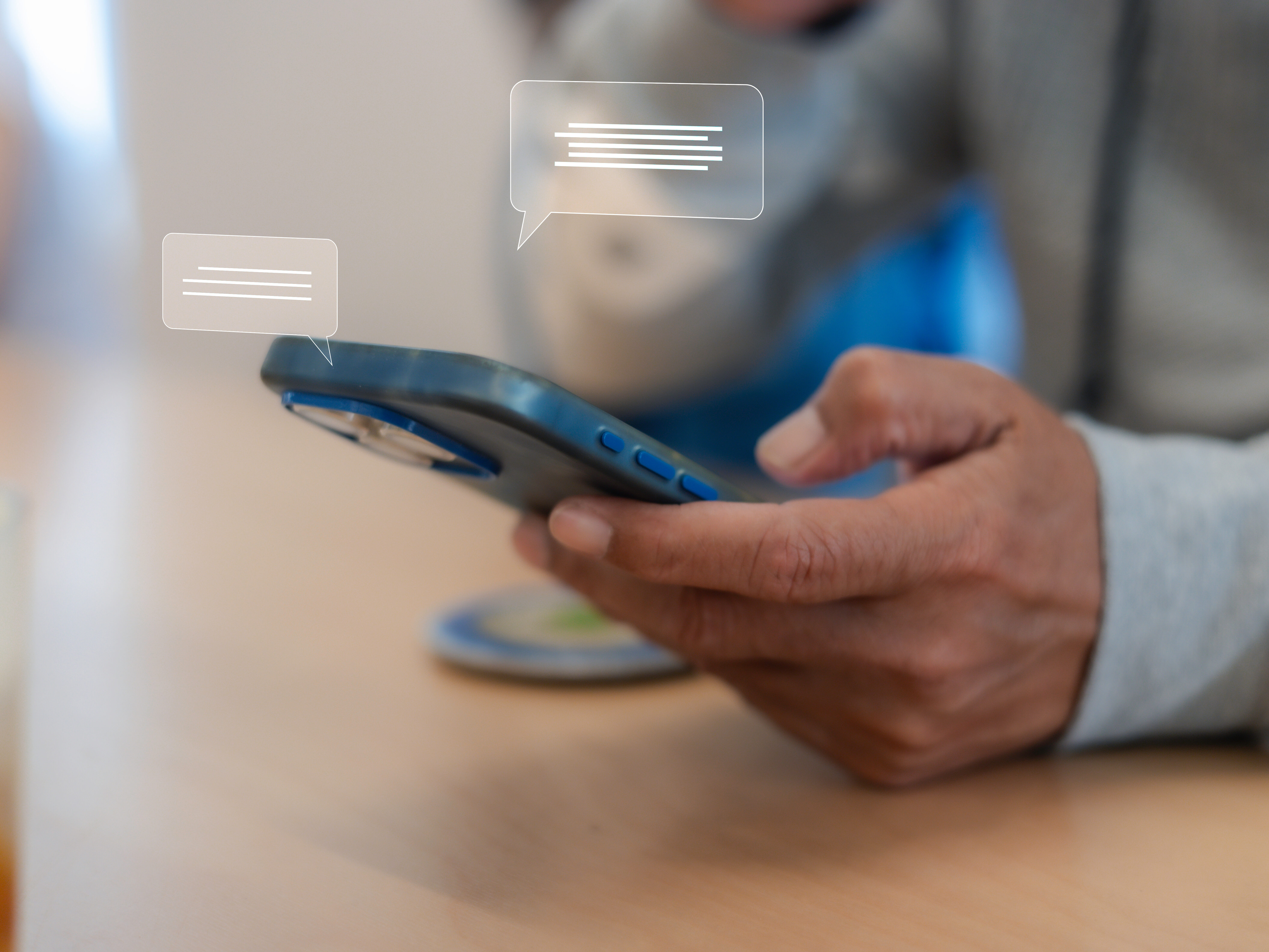 Close up man using smart phone, Social media marketing concept. hand using smartphone typing, chatting conversation in chat box icons pop up